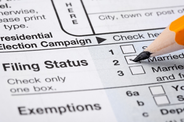 Preparing a Form 1040 for a US Individual Income Tax Return.